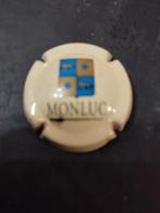 Een champagne capsule met een schild erop van monluc kleur v, Enlèvement