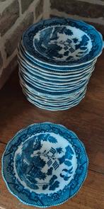 Blue Willow-patroon tassen en bordjes, Ophalen