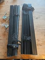 Zwarte metalen lamellen, Ophalen