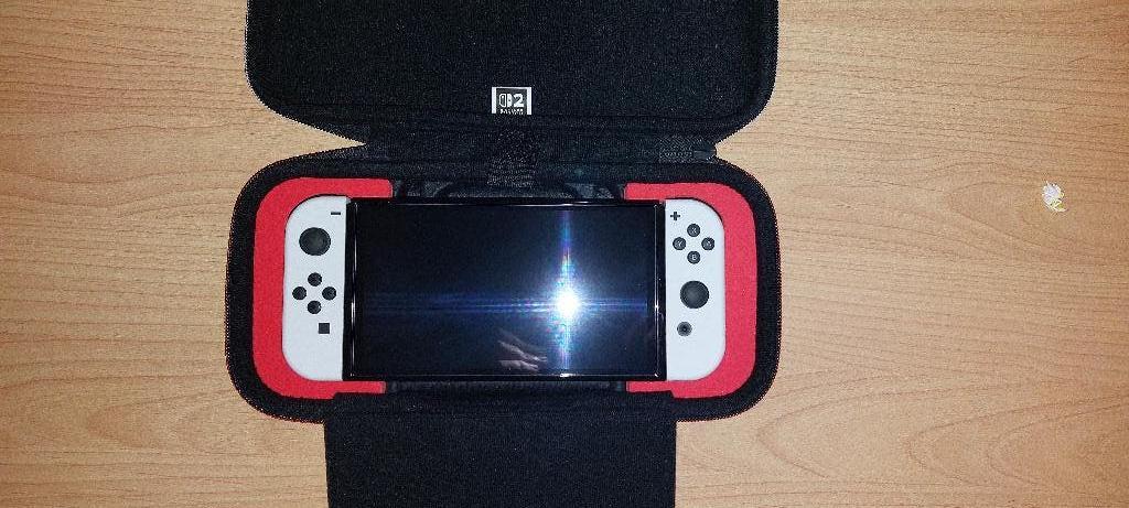 Nintendo Switch OLED wit amper gebruikt 6 maanden oud, Games en Spelcomputers, Spelcomputers | Nintendo Switch, Zo goed als nieuw