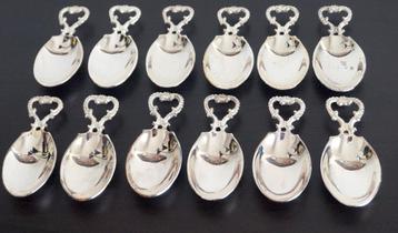 12 verzilverde presentatielepels beschikbaar voor biedingen