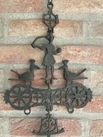 wandornament gietijzer, Ophalen