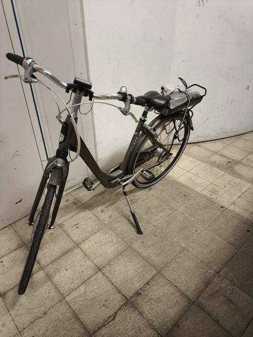 Elektrische fiets Sparta damesfiets, BATTERIJ KAPOT., Fietsen en Brommers, Elektrische fietsen, Zo goed als nieuw, Sparta, Ophalen