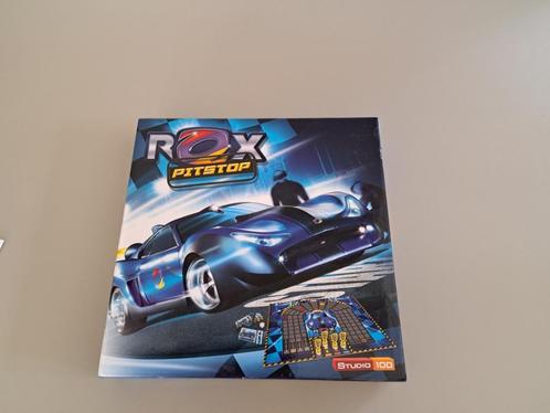 Rox Pitstop spel van studio 100, Hobby en Vrije tijd, Gezelschapsspellen | Bordspellen, Zo goed als nieuw, Een of twee spelers