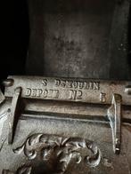 Giet ijzeren kolenbak, Ophalen