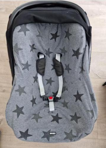 Maxi cosi beschermhoes Dooky disponible aux enchères