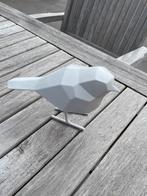 3 dimencionaal wit vogeltje, Ophalen