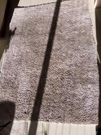 Tapijt in zandkleur, Ophalen