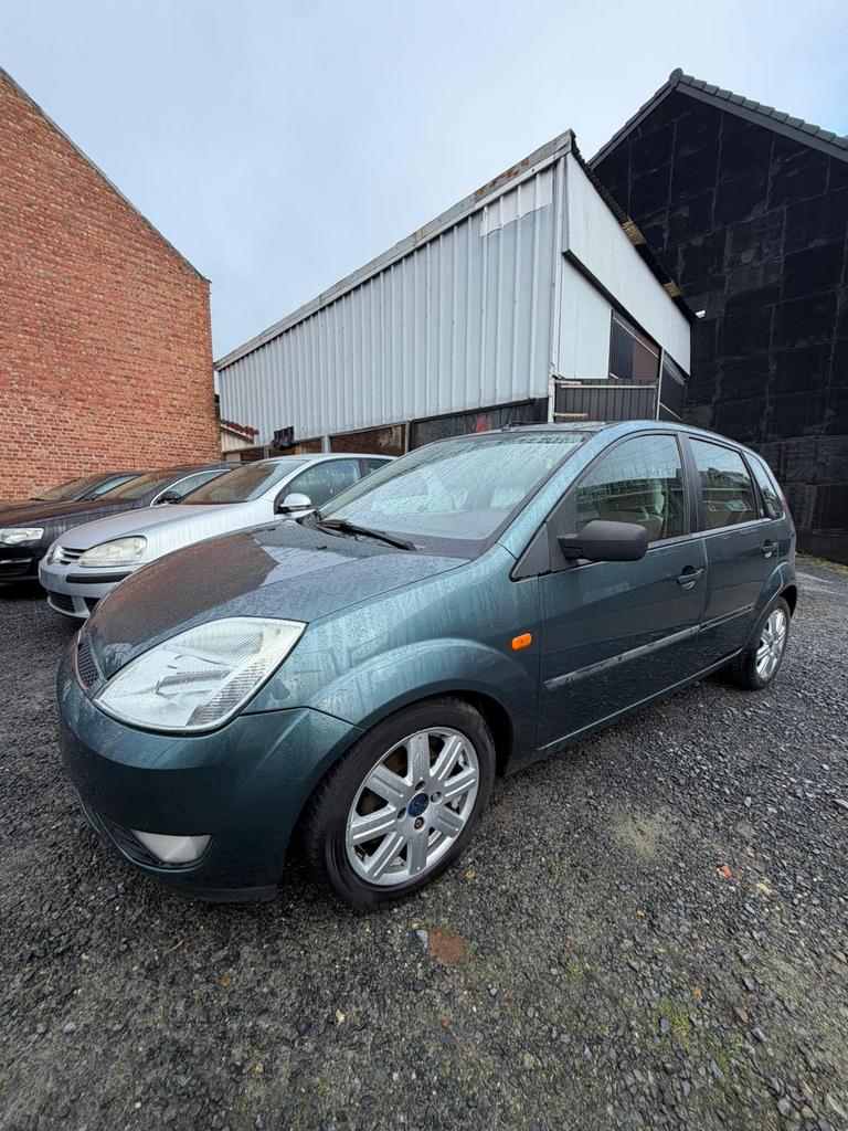 Ford Fiesta 1.4i 16v Ghia KLAAR VOOR REGISTRATIE, Stof, Handgeschakeld, Particulier, Fiësta