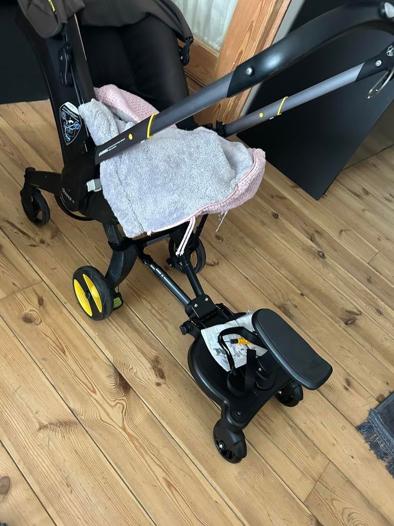 Doona met verkleurde kap door de zon, Enfants & Bébés, Buggys, Enlèvement