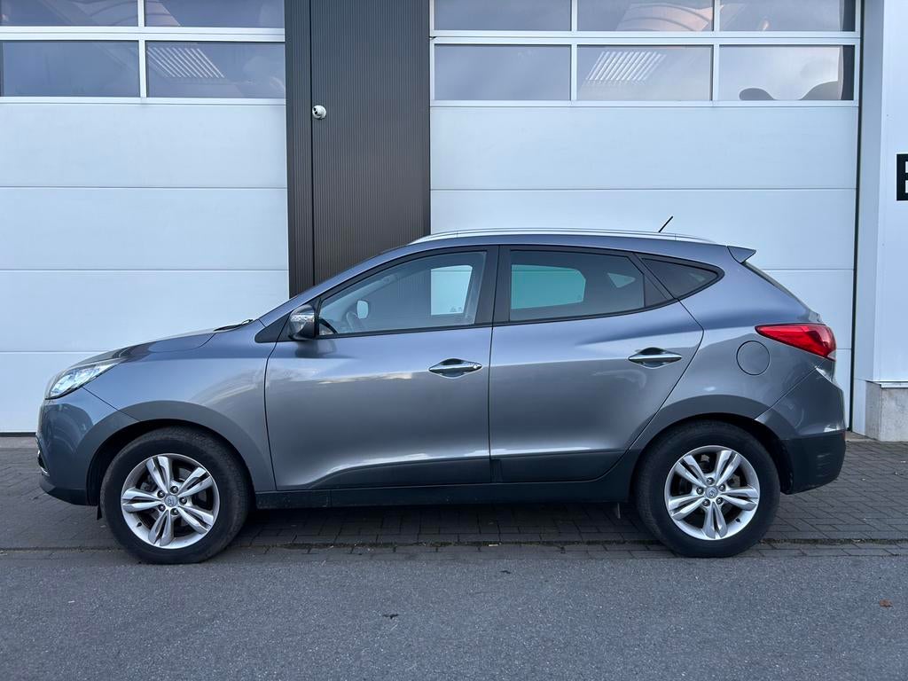 Hyundai IX35 1.6i met 77000km 1ste eigenaar, Auto's, Hyundai, Euro 5, Zwart, Leder, Handgeschakeld