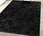 Tapijt zwart  in koeienhuid. Merk Un amour de tapis., Huis en Inrichting, Stoffering | Tapijten en Vloerkleden, Ophalen, Zwart