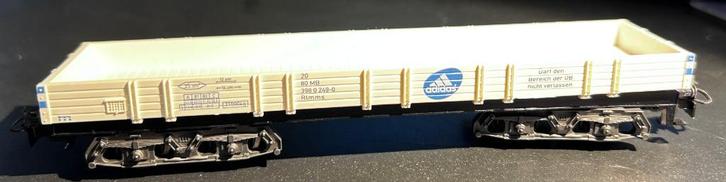 3284. 4-assige platte wagen „Adidas” H0 Märklin., Hobby en Vrije tijd, Modeltreinen | H0, Gebruikt, Wagon, Märklin, Ophalen of Verzenden