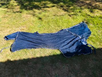 Vliegendeken met zadeluitsparing beschikbaar voor biedingen