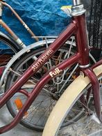 Damesfiets met achteruit traprem, Ophalen