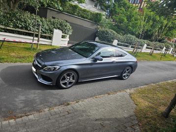 Mercedes C180 Coupé - Pano dak/AMG pack/Manueel, Auto's, Mercedes-Benz, Achterwielaandrijving, 4 cilinders, Leder en Stof, Handgeschakeld