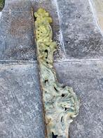 Oud ijzeren ornament, Ophalen