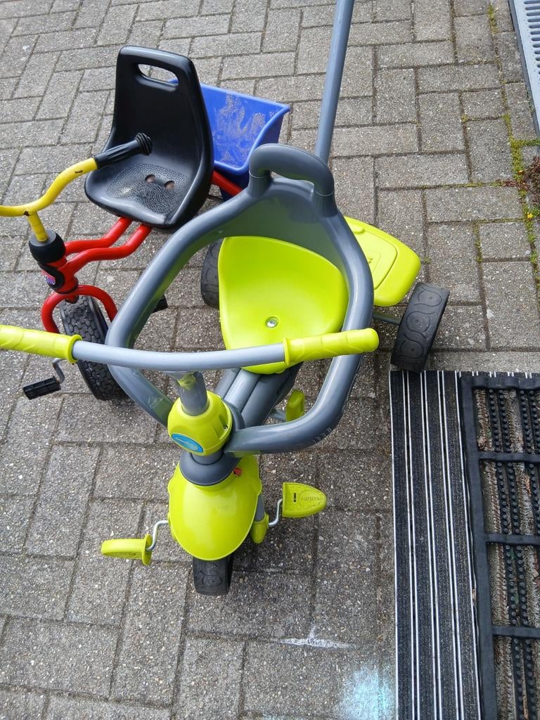 Groene driewieler met duwstang, Ophalen, Duwstang