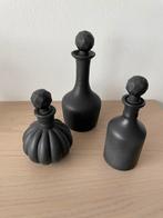 3 glazen flesjes, Ophalen