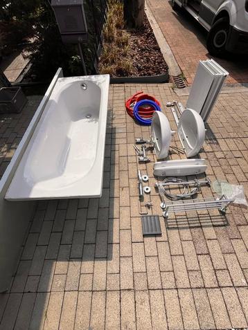 Badkamer renovatie badkuip lavabo kranen douche