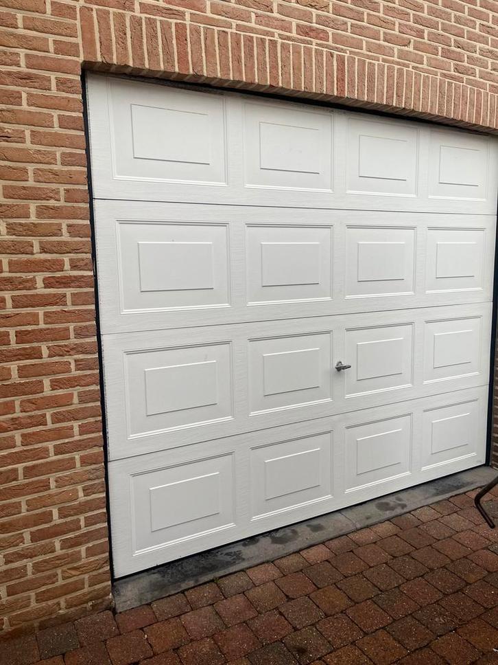 Garagepoort , sectionale poort ., Doe-het-zelf en Bouw, Deuren en Vliegenramen, Zo goed als nieuw, Ophalen of Verzenden