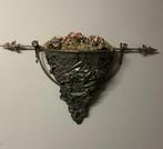 Hanger voor bloemen, Ophalen