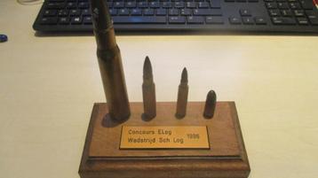 Présentoir munitions inerte souvenir d'un concours de tir.