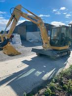 Mini-pelle Komatsu, Enlèvement