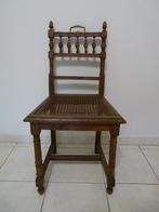 Antieke stoel met rattan cane webbing zitvlak, Ophalen