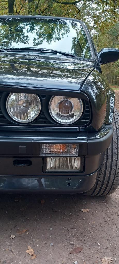 Zwarte BMW E30 325i cabrio in topstaat!, Auto's, Oldtimers, Particulier, Alarm, Boordcomputer, Centrale vergrendeling, Elektrische buitenspiegels