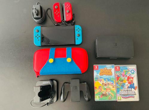 Switch OLED 2023, Games en Spelcomputers, Spelcomputers | Nintendo Switch, Gebruikt, Switch OLED, Met 3 controllers of meer, Met games