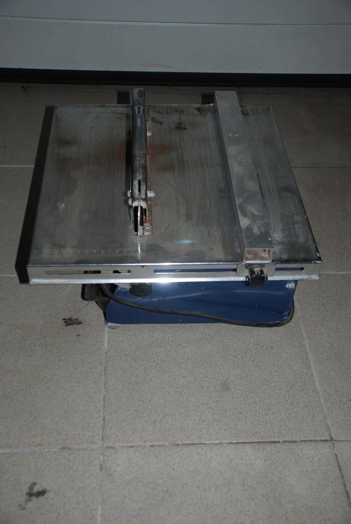 Tegel zaagmachine, Ophalen