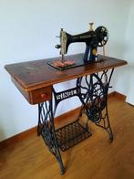 Oude SINGER naaimachine uit 1954, Ophalen