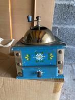 Handmatige vintage koffiemolen, Ophalen