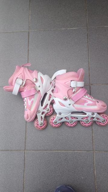 Roze rolschaatsen maat34 ->zwarte rolschaatsen maat36, Ophalen, Gebruikt, Kinderen