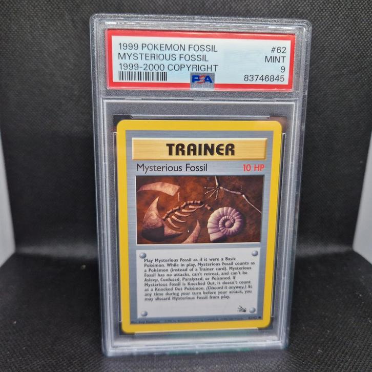 Mysterious Fossil 1999-2000 Copyright Fossil PSA 9, Hobby en Vrije tijd, Verzamelkaartspellen | Pokémon, Ophalen of Verzenden