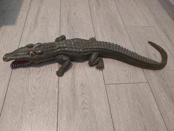 Speelgoed krokodil (plastiek) beschikbaar voor biedingen