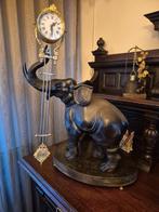 bronzen olifant mysterieux, Ophalen