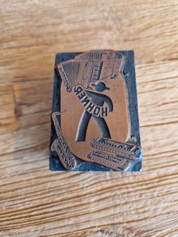Oude print stempel Hohner accordeon mondharmonica saxofoon  beschikbaar voor biedingen