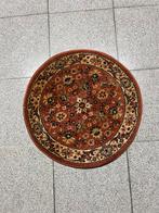 Rond oosters tapijt – bloemenmotief – warme kleuren, Enlèvement