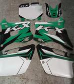 Kit autocollant kx, Ophalen