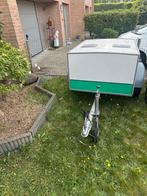 Honden aanhangwagen, Ophalen