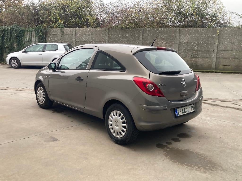 Opel Corsa 1.2 benzine 2013 met 122000km*EURO 5* garantie*, Auto's, Opel, Euro 5, Stof, Zwart, 4 cilinders