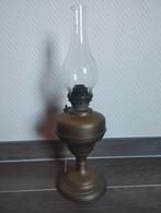 Olielamp met koperen voet, Ophalen