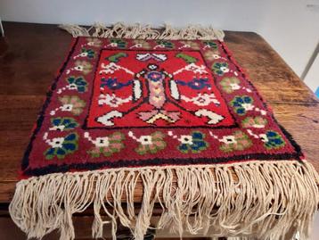 Petit tapis persan, Enlèvement