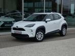 Toyota Yaris Cross 1.5i HYBRID Dynamic +Carplay +Parkeercame, Auto's, Stof, Gebruikt, USB, Wit