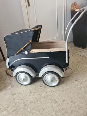 vintage poppenwagen beschikbaar voor biedingen