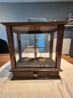 Apothekers weegschaal met gewichtjes, Enlèvement