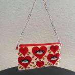 Hartvormige clutch met oog, handgemaakte tas uit Colombia, Handtassen en Accessoires, Tassen | Damestassen, Ophalen of Verzenden