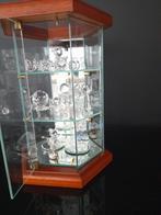 Swarovski kastje met beeldjes, Ophalen